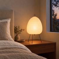 Ovo lamp in a minimal interior with warm light
